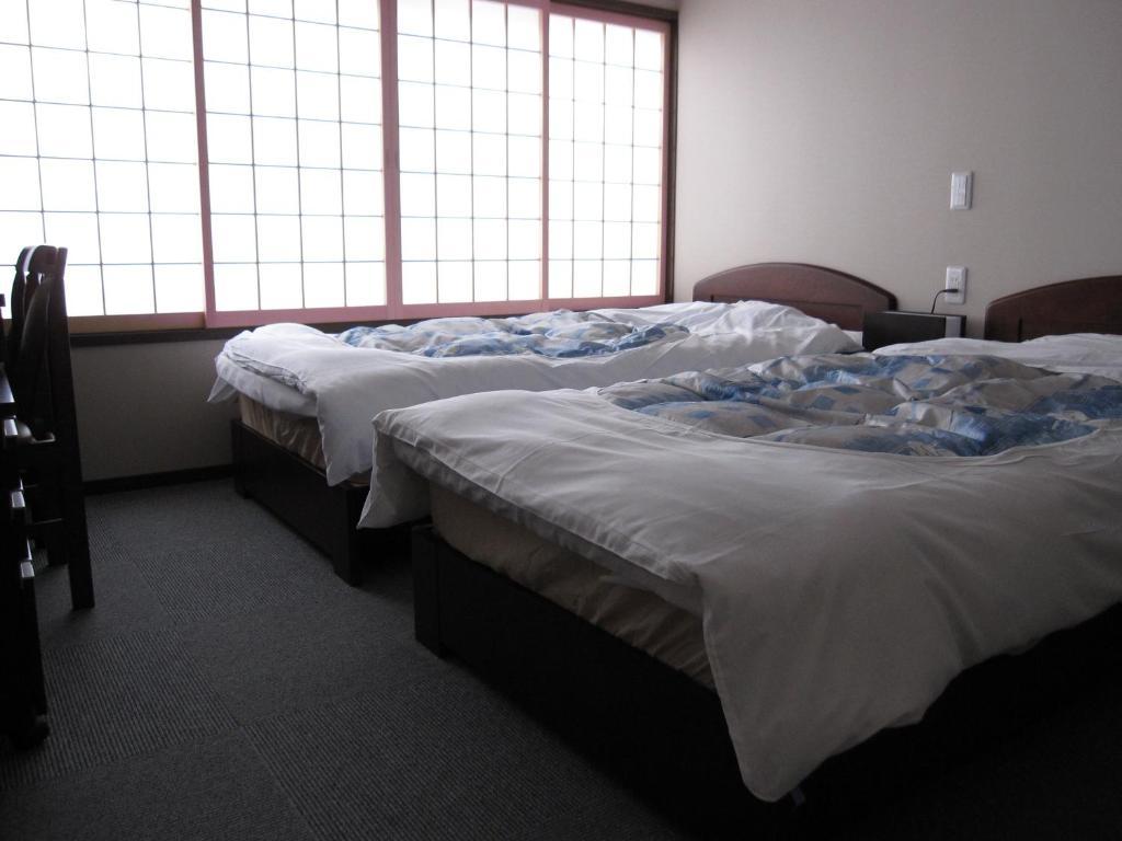 Manshuya Hotel Gudzso Szoba fotó
